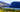 Okanagan Valley vineyard with lake and mountains in the back
